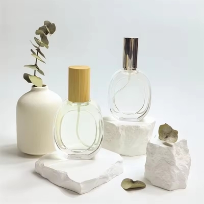 Botelhas de perfume de vidro Oblatas Rotundas Botelhas transparentes Botelhas de pulverização portáteis